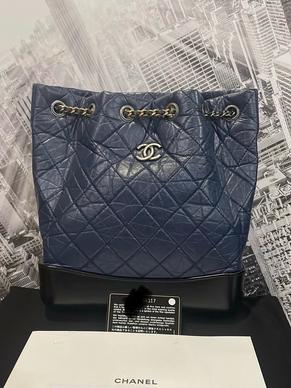 CHANEL Navy Quilted Leather Drawstring Shoulder Bag with Black Base Medium